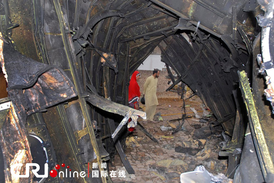 遗体 巴基斯坦/当地时间2012年4月21日，巴基斯坦阿伯塔巴德，遇难者遗体抬着...