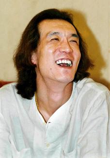 李咏谈个人收入 工资奖金每月共扣7000多元税